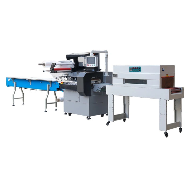 Pillow wrapping machine + heat shrink oven